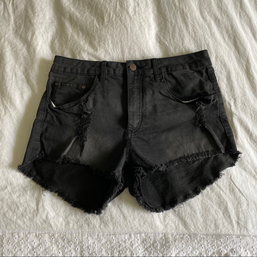 Distressed denim shorts